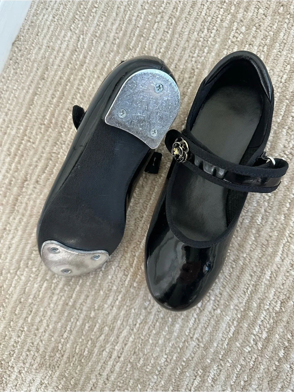 Girls Black Patent Tap Dress Shoes with Floral Accent’s Strap
